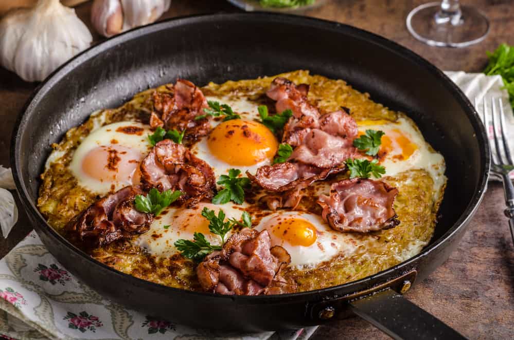 skillet full of food freshly cooked